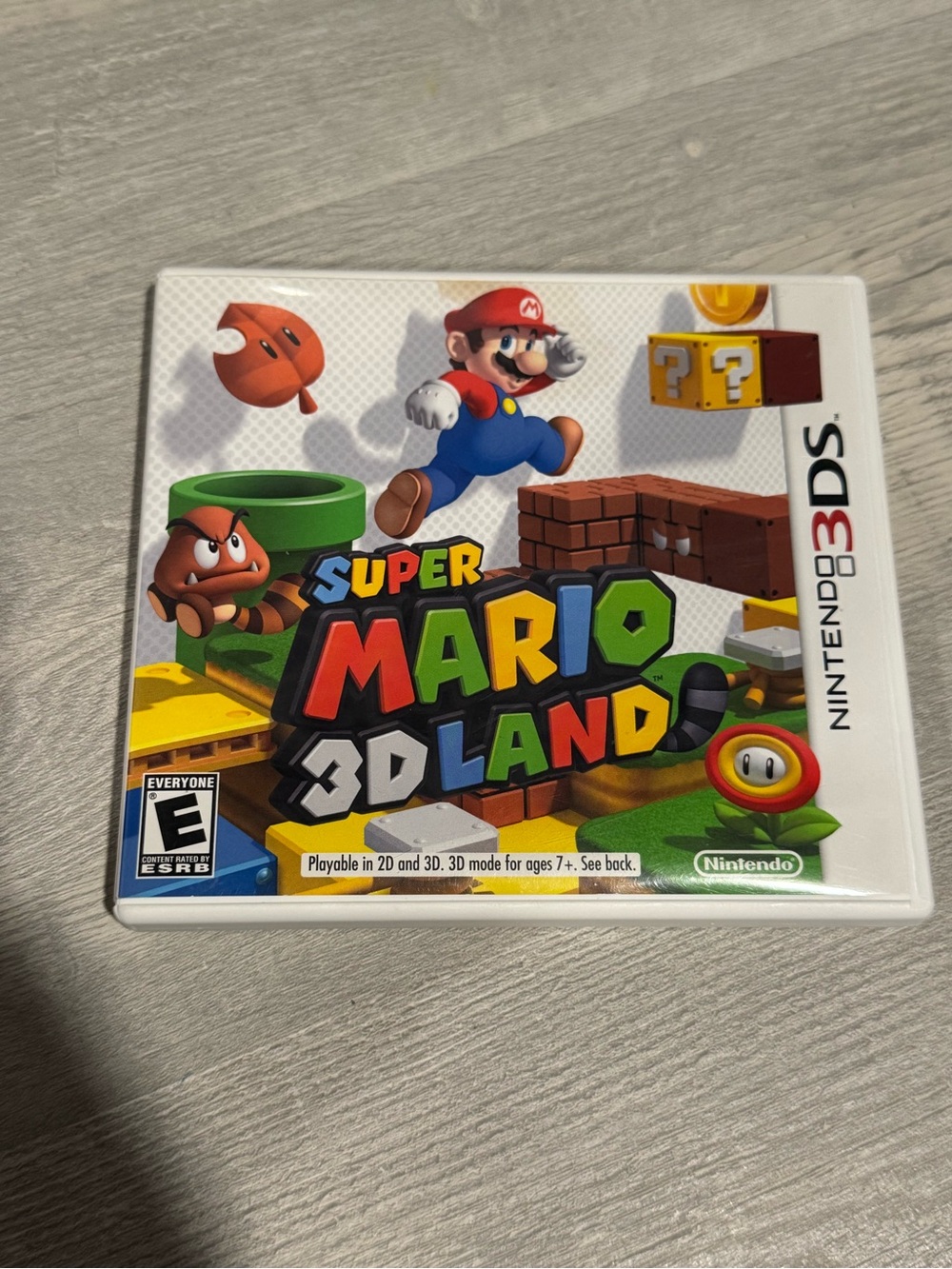 Nintendo Super Mario 3D Land - White Case with Multicolor Logo
